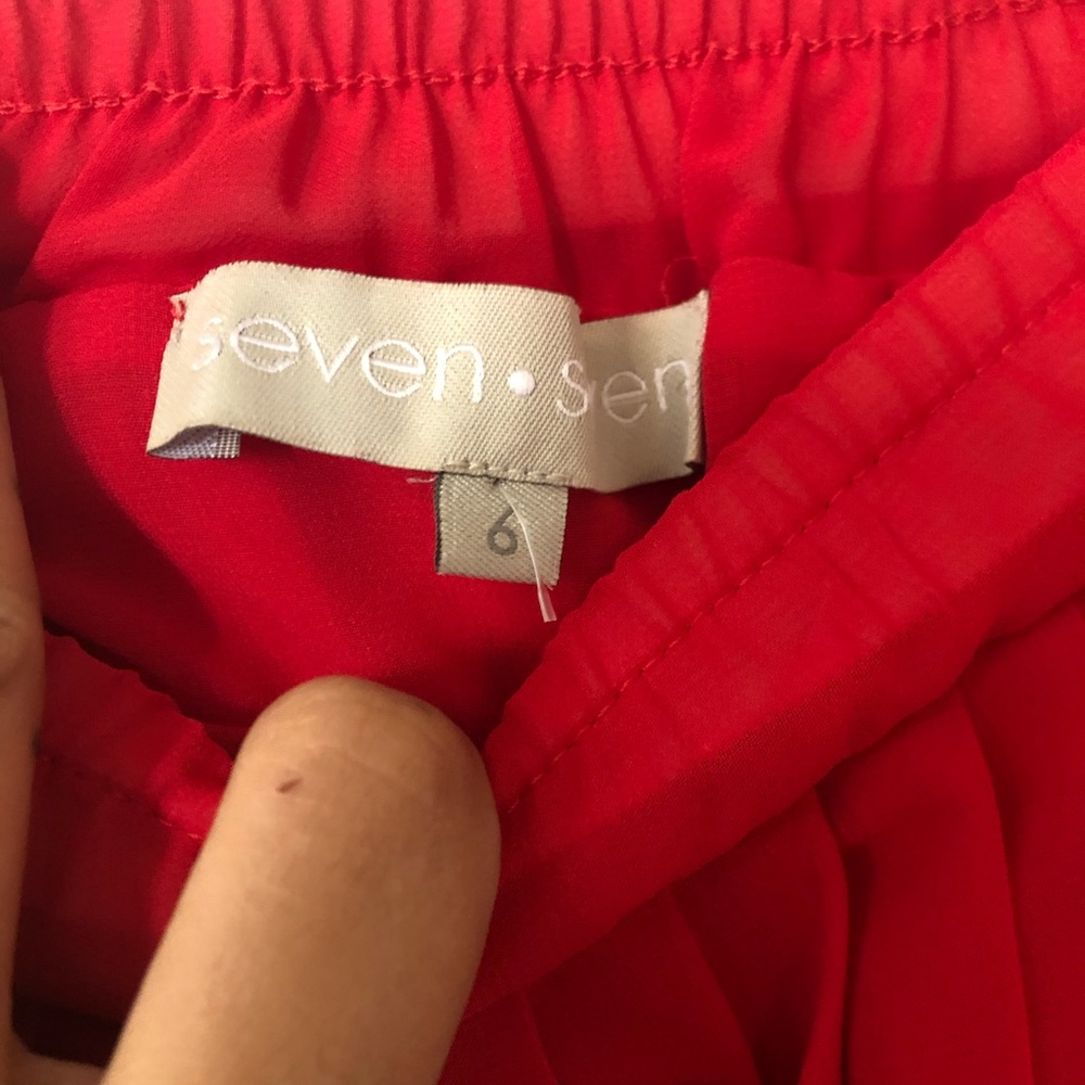 Red pleated skirt